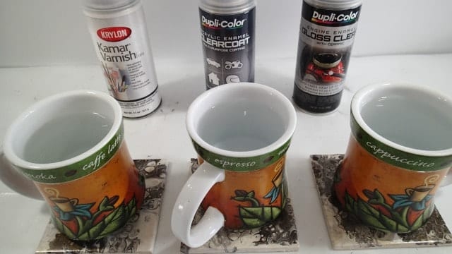 Comparing spray protective finishes for acrylic painted ceramic tiles. Which ones are heat resistant and don't stick to hot coffee mugs. Video comparison.