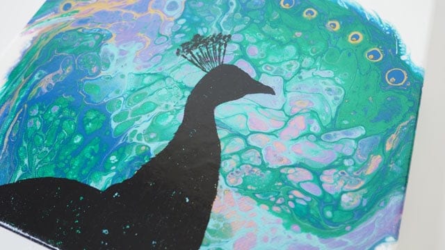 Painting a silhouette on your acrylic poured background using a template - video shows you how