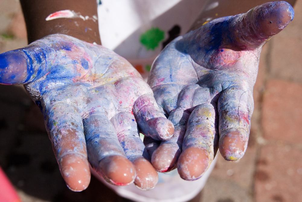 hands with paints