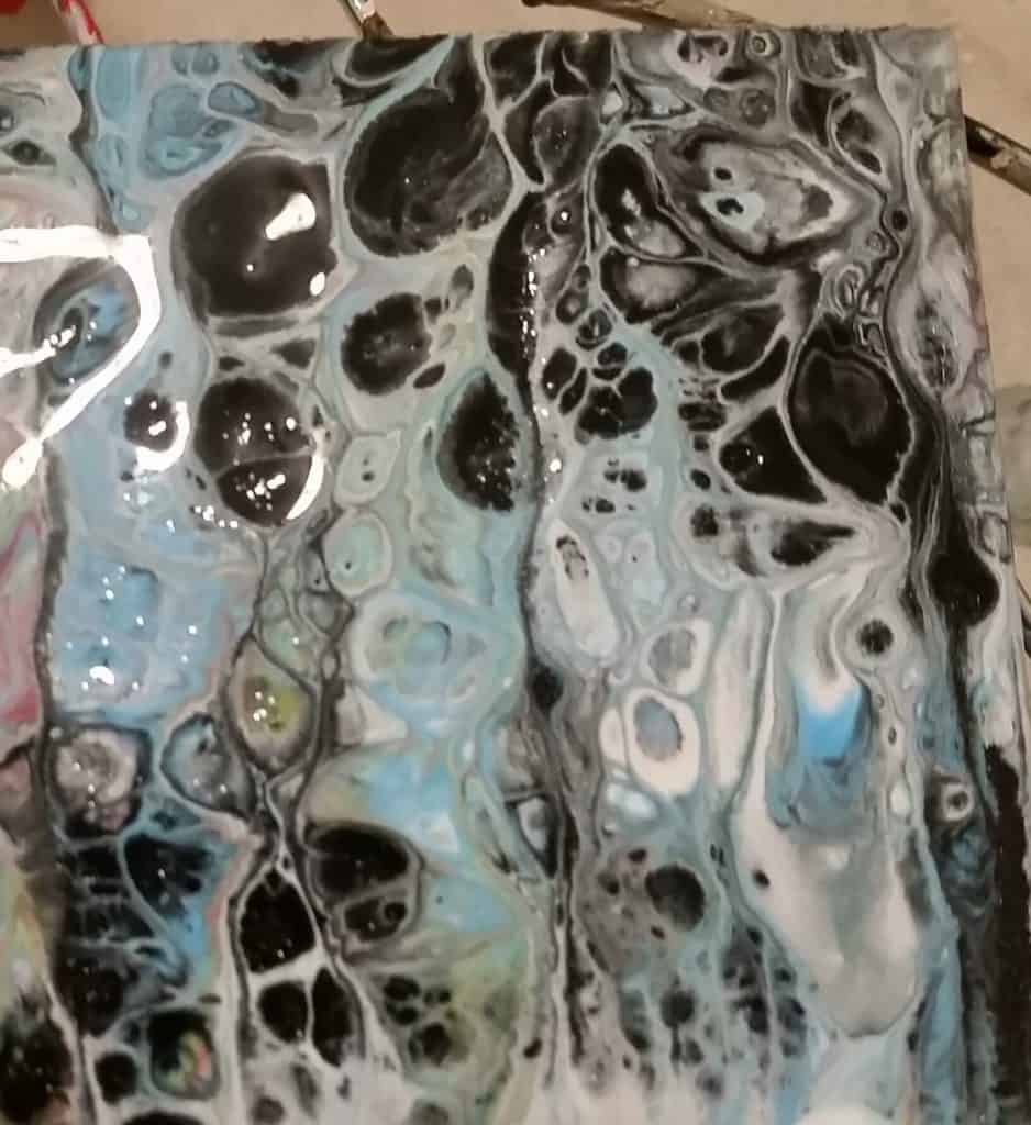 black white and blue acrylic pour